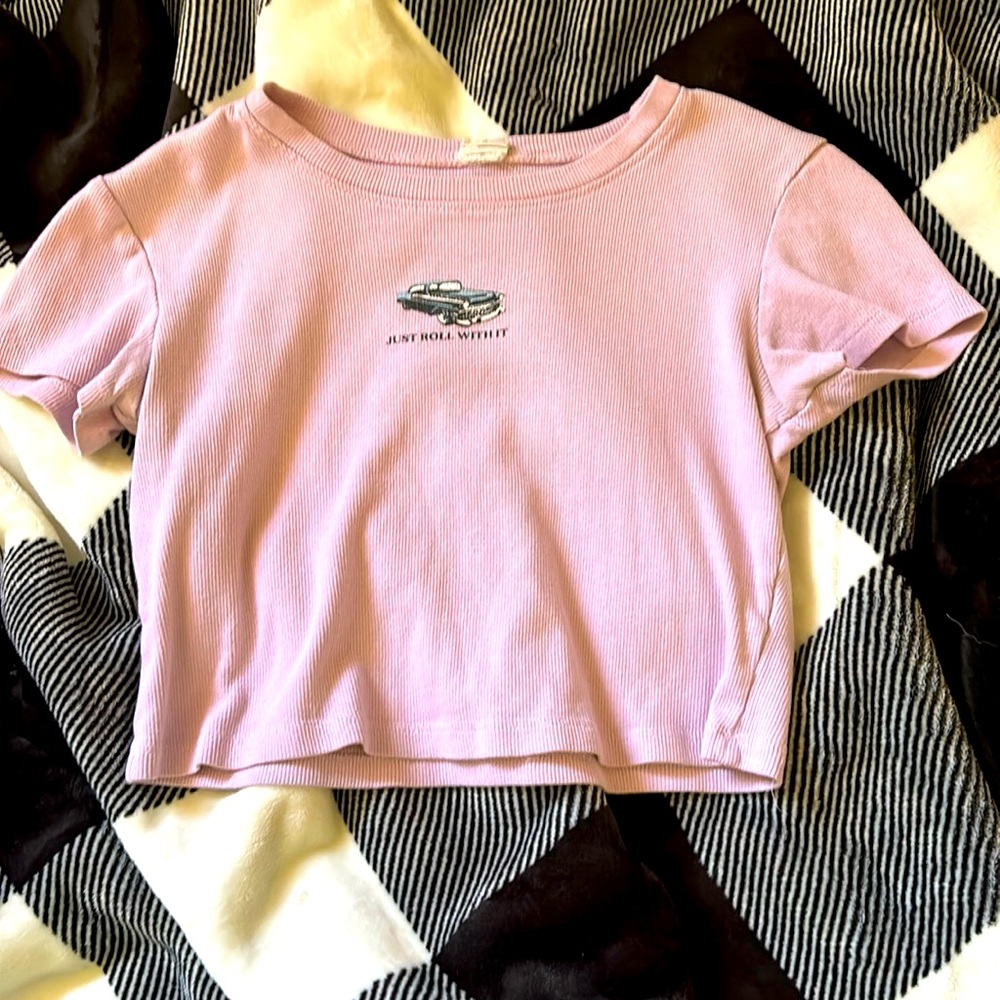 Purple crop top worn a little bit